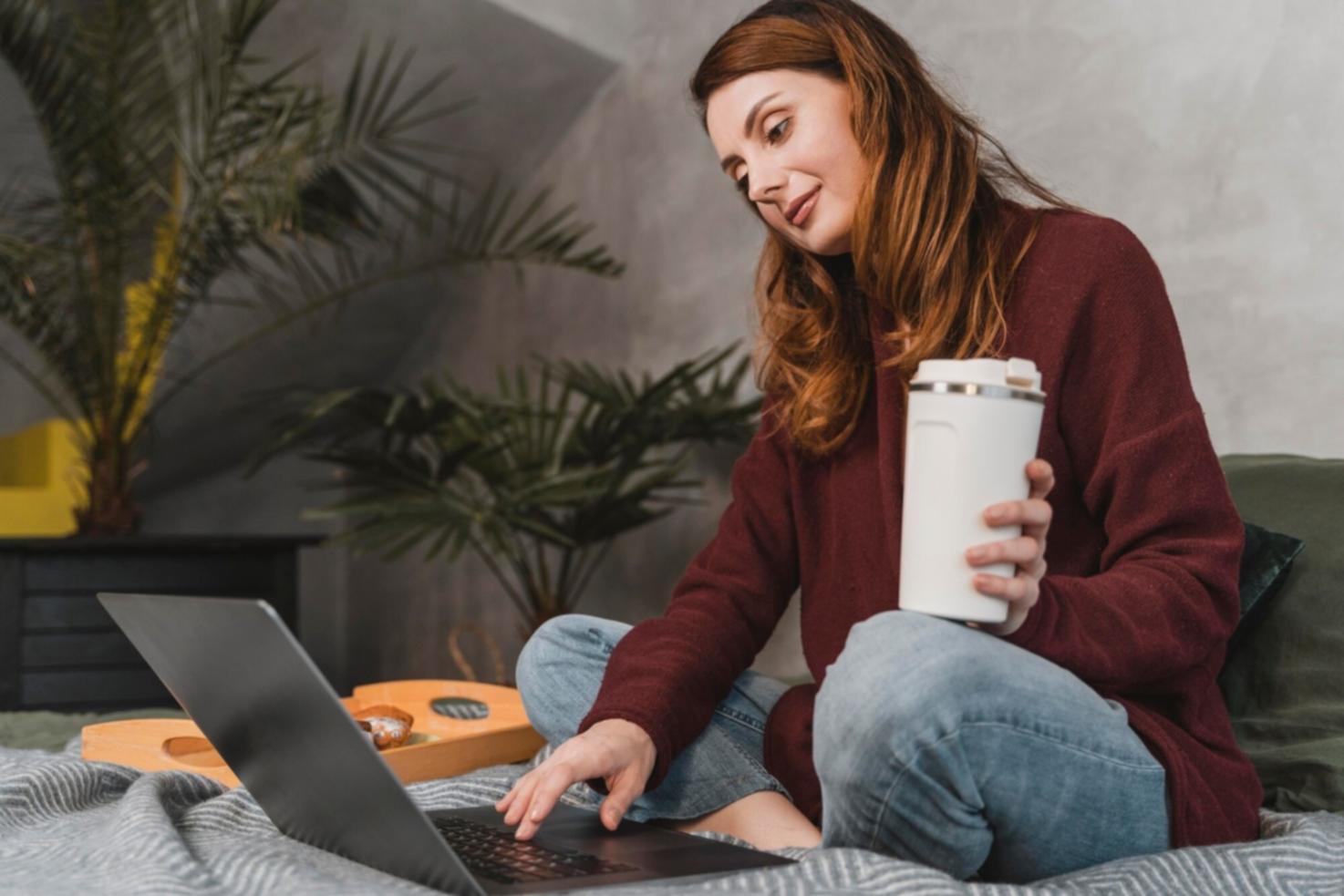 Instructor teaching coding concepts to students in collaborative learning environment