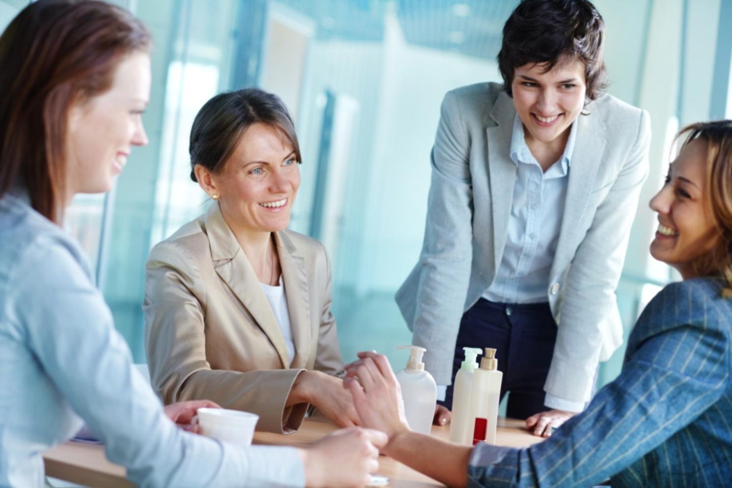 Students working collaboratively on development projects with instructor guidance